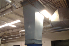 Chute from the slant screen separators mounted on the roof to the baler inside the building.