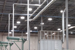 Piping being installed in a new plant with the TWM cutters mounted on cutter stands.