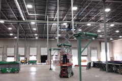Cutters, silencers and conveying lines during installation inside of a new facility.